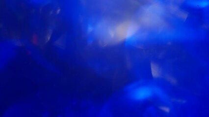 real optical blue bokeh on black background