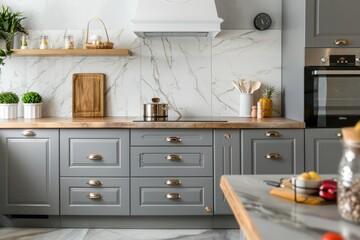 Wall Mural - A kitchen interior with grey cabinets and a marble countertop, suitable for use in home decor or real estate listings