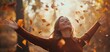 © Khmel - Joyful woman enjoying autumn leaves outdoors