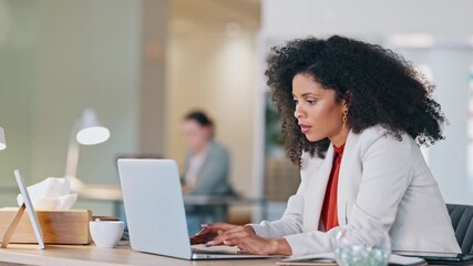 Poster - Tired and stressed female with a headache sitting at her desk inside a stylish office or creative startup agency. Exhausted and trendy business woman in pain while typing on a laptop, working late