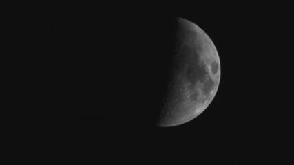 Wall Mural - waxing crescent moon at 44.5% illumination drifting