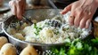 © Best - Ricing: The method of pressing cooked vegetables through a ricer to obtain a rice-like texture, commonly applied to potatoes and cauliflower for a refined, fluffy result.