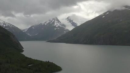 Poster - Aerial view of Portage Glacier and Portage Lake mountain landscape - 4K Drone