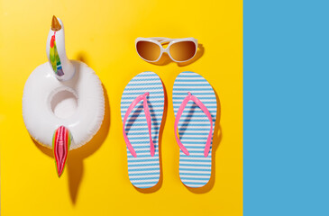 Poster - A vibrant summer vacation scene with flip flops, shades, and a floating flamingo