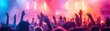 © Mnt - Vibrant concert scene with raised hands, colorful lights, and energetic crowd celebrating live music and excitement.
