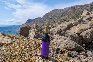 Sticker - Bottle of wine by the sea