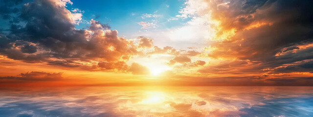 Wall Mural - A beautiful sunset over the ocean with a reflection of the sun on the water