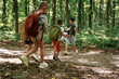 © standret - Long way, exploring. Kids in forest at summer daytime together