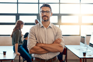 Poster - Portrait, manager and confident business man in coworking office for career pride. Face, arms crossed and leader, entrepreneur and creative web designer with glasses in startup for expert experience