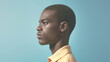 © Olya Fedorova - Portrait of a guy in profile on a blue background