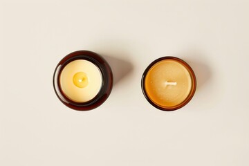 Pair of ceramic tea light holders with matching candles. A gift boxed set for home decor and simple elegance.