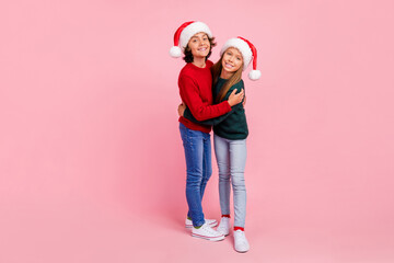 Poster - Photo of two people kids boy girl cuddle together celebrate new year isolated pastel color background