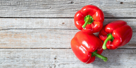 Wall Mural - Fresh sweet bell pepper ( paprika ) photography red , green and yellow . Colorful vegetable . Top view