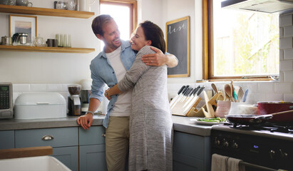 Poster - Couple, love and happy hug in kitchen with healthy relationship, support and security for trust. Smile, woman and man with romantic embrace in home for loyalty, marriage commitment and laugh together