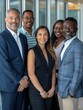 © Fridocha - Four Diverse Business Professionals Smiling Together