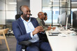 © Caia Image - Businessman with headset in office