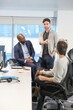 © Caia Image - Businessmen talking in office