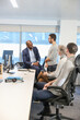© Caia Image - Businessmen talking in office