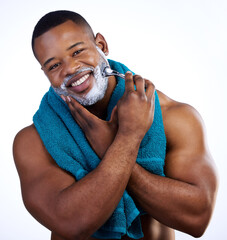 Black man, portrait and shaving cream in studio for skincare, grooming and razor for hair removal with pride. Male person, beard care and foam in white background for facial, cleaning or dermatology