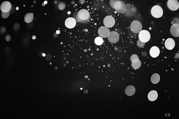 blurred silver bokeh on black background