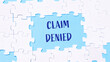 © Алла Морозова - A jigsaw puzzle with the word claim written in blue letters
