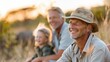 © LifeMedia - A family of three sitting in tall grass, attentively observing wildlife during their nature excursion, representing familial bond and the shared experience of discovery.
