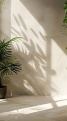 Wall Mural - A large plant is sitting in a pot in front of a wall