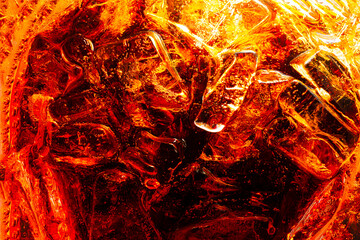 Wall Mural - Macro cola background. Cola background with ice and bubbles. Side view background of refreshing cola soda with carbonation in vintage tone. Cola, Soda, Bubbles.