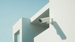 © Anastasiia - Outdoor surveillance camera on a modern white building wall with sharp shadow. Minimalistic architectural detail under clear sky. Security and monitoring concept