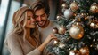 © Pinklife - A couple in cozy clothing, happily decorating a Christmas tree with gold ornaments. They are smiling and enjoying the festive moment together. The background is softly lit.