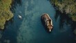 © Nuttaya Nampai - An aerial shot of a grizzly bear fishing in a river, with its reflection visible in the water, capturing the beauty of wildlife.