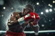 © Ilia Nesolenyi - A professional boxer throws a strong punch in the ring, sweat flying as he engages in an intense match under bright arena lights