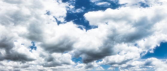 Wall Mural - the sky is blue with a few clouds scattered throughout