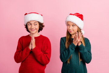 Poster - Photo of two kids girl boy thinking cunning on christmas time isolated pastel color background