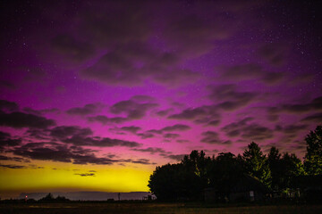 Wall Mural - northern lights purple sky at night, red sky