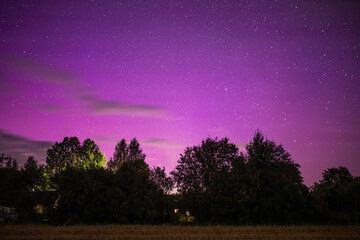 Wall Mural - northern lights purple sky at night, red sky