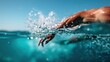 ©  Shomixer - This image captures a person swimming in the pristine blue ocean, with water splashing around their hands as they propel forward, illustrating a dynamic summer scene.