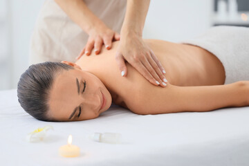 Poster - Beautiful young woman receiving massage in spa salon