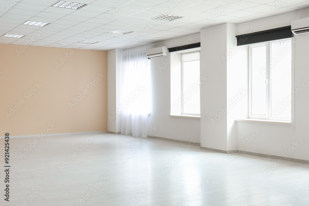 Light curtain and beige wall in empty room