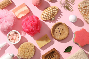 Canvas Print - Composition with cosmetic products and different bath supplies on pink background