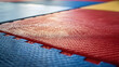 © Mahemud - Judo and Karate Mat: Close-up of judo and karate mats, emphasizing martial arts.
