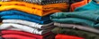 © sungedi - Stack of Colorful Folded Fabric