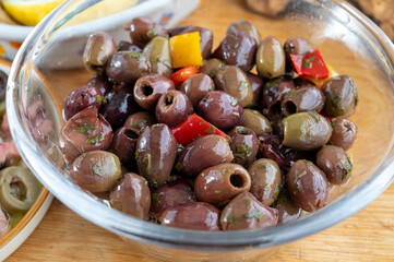 Pickled and marinated olives Ligurian style, tasty Italian starters, antipasti, tapas