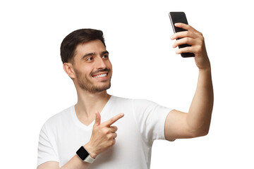 Young handsome man in white t-shirt holding phone and taking selfie photo