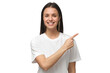 © Damir Khabirov - Smiling young woman in white t-shirt pointing right with index finger
