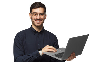 Wall Mural - Young confident business man in deep blue shirt holding laptop and smiling at camera, isolated on gray background