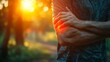 © Watasiwa - Man holding arm with pain in the shoulder outdoors