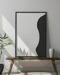 minimalistic poster frame with black and white graphics on a modern living room