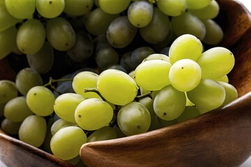 Poster - Fresh green grapes in wooden bowl