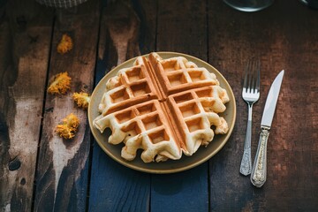 Wall Mural - Plate with baked waffles on the table